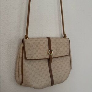 Classic Gucci crossbody mini purse with leather piping